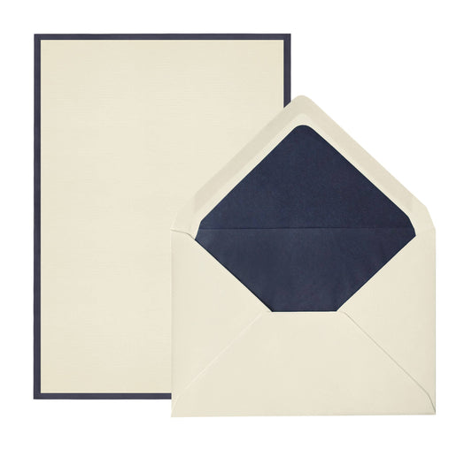 Beige card with a navy envelope correspondence letter
