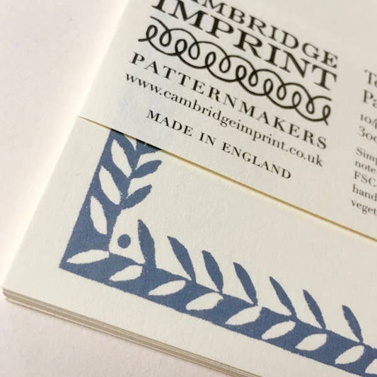 Cambridge Imprint patternmakers packaging with blue leaf design and branding text.
