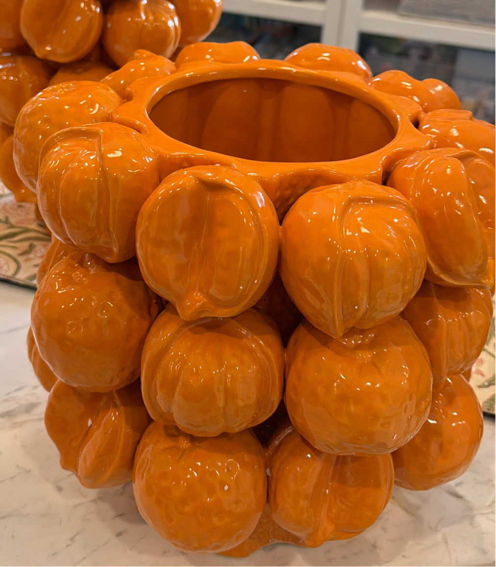 orange fruit vase