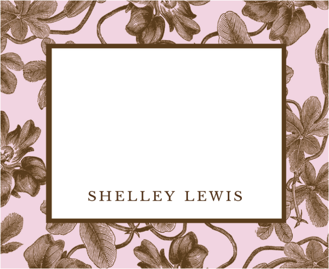 Floral design with a white center and 'SHELLEY LEWIS' text on a pink background