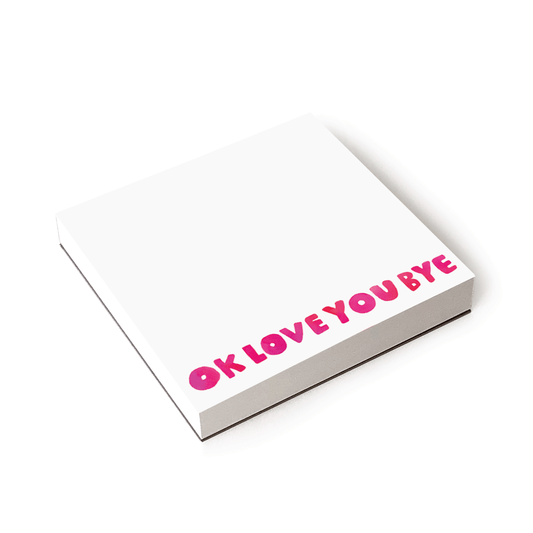 Notebook with 'OK LOVE YOU BYE' text on a white background