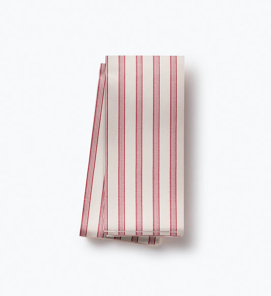 Folded tissue paper with red and white stripes on a white background