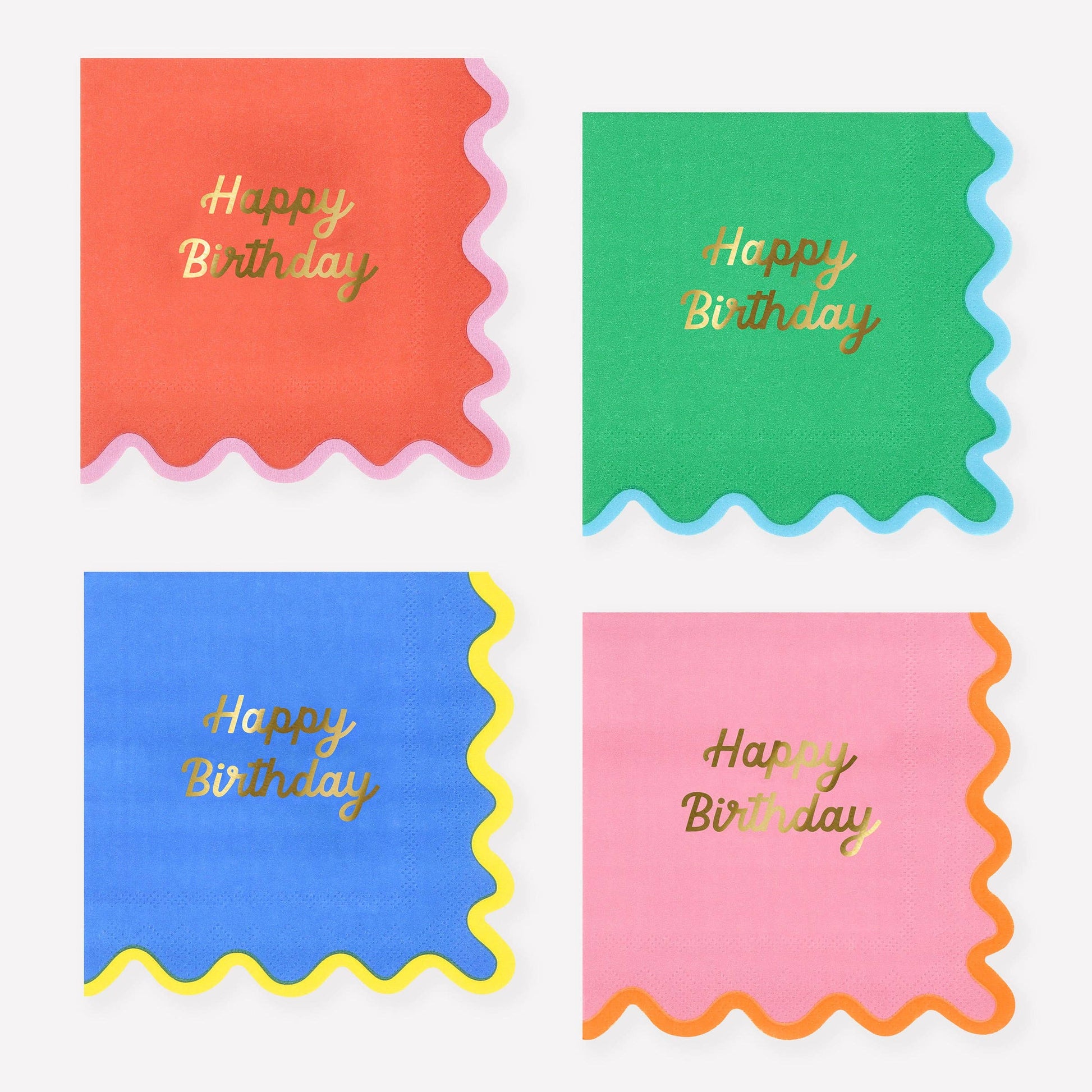 Four colorful napkins with 'Happy Birthday' text on a white background