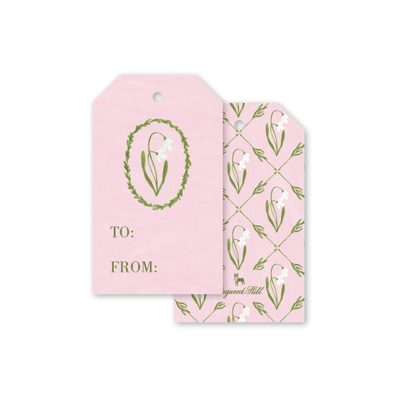 Two pink gift tags with green floral patterns on a white background
