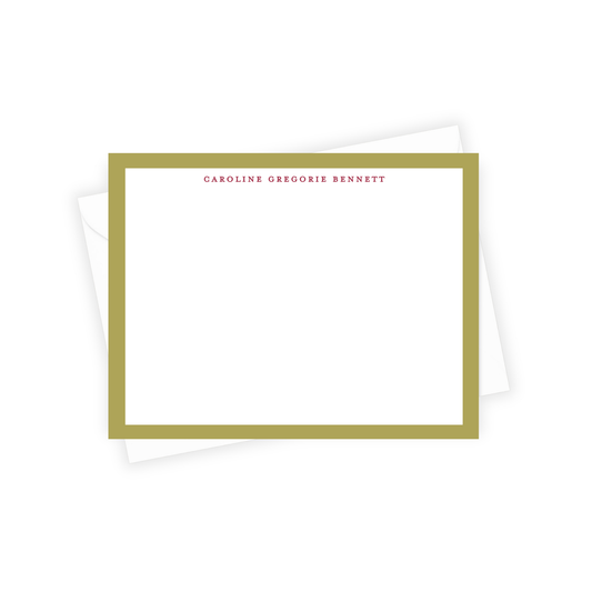 Stationery set with a gold border and personalized name on a white background