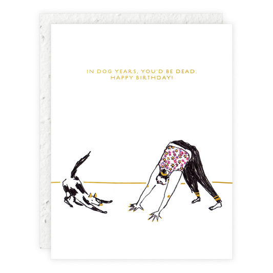 A card on white background of human and dog doing a downward dog with the text saying "In Dog Years, You'd Be Dead. Happy Birthday!