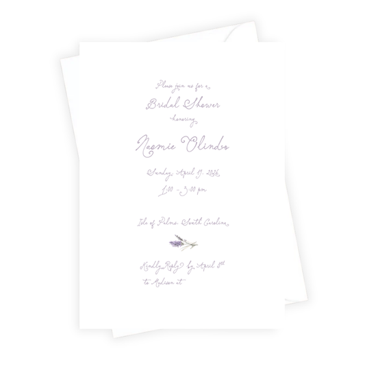 White bridal invitation with printed text and a flower design on a white background