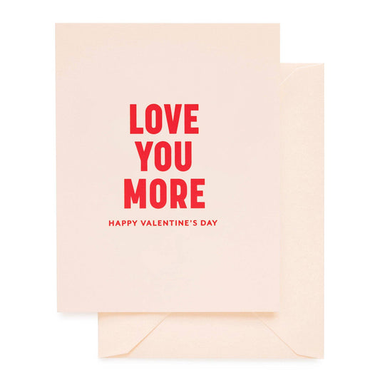Valentine's Day card with 'Love You More' text on a beige background