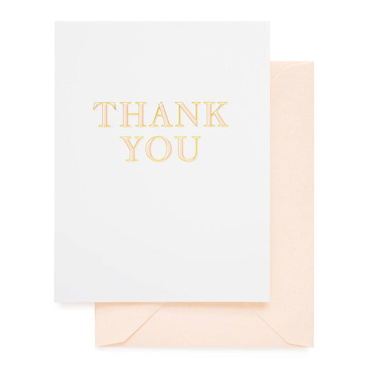 White card with 'THANK YOU' in gold text and a matching envelope on a white background