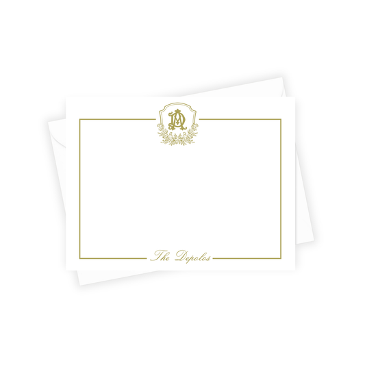 White pillow with gold emblem and text on a white background
