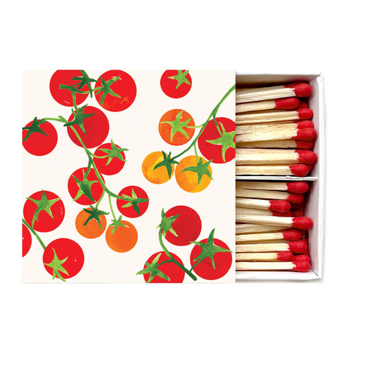Matchbox with tomato design on the cover and matches inside