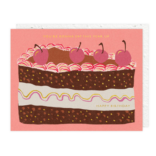 Birthday card with a cake illustration and text on a pink background