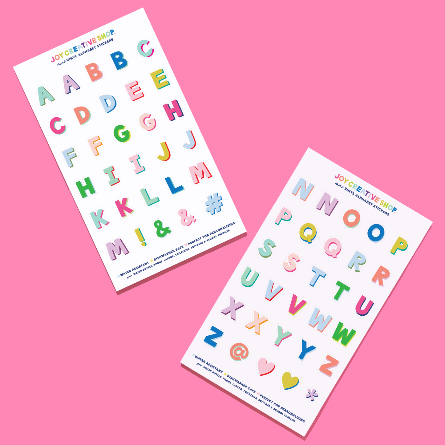 Two sheets of colorful alphabet stickers on a pink background