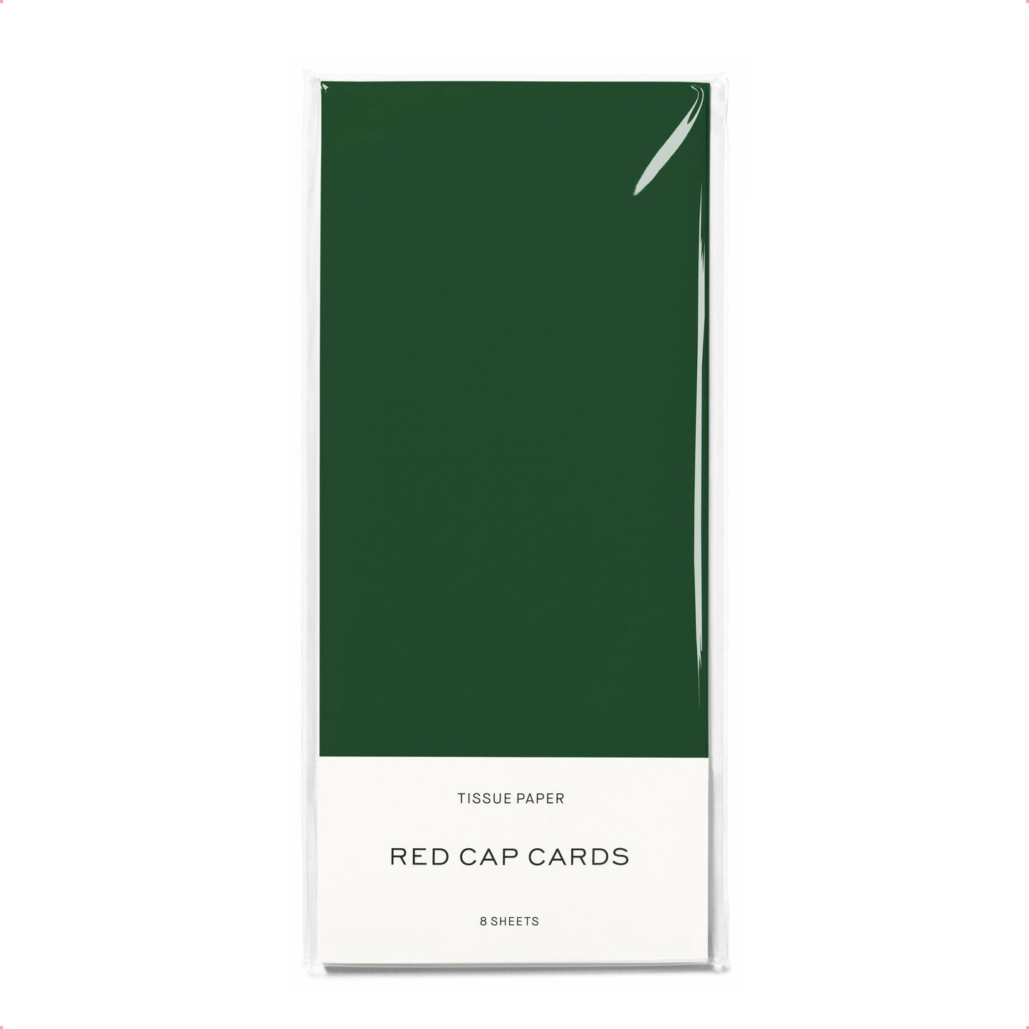 Green tissue paper pack with 'Red Cap Cards' branding on a white background