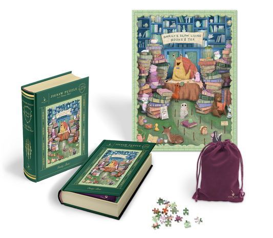 Jigsaw puzzle set with books, a purple drawstring bag, and scattered pieces on a white background