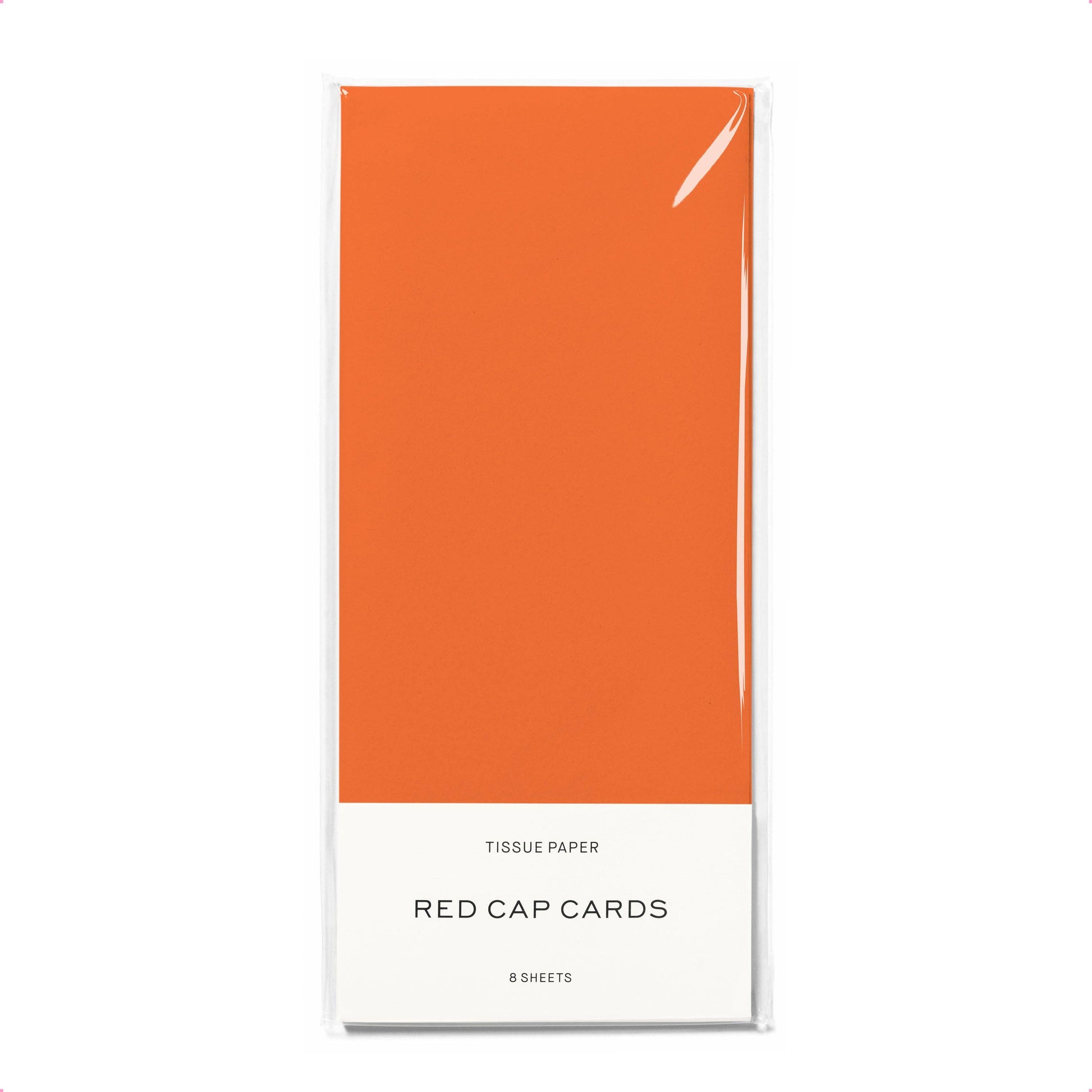 Orange tissue paper pack with 'Red Cap Cards' branding on a white background