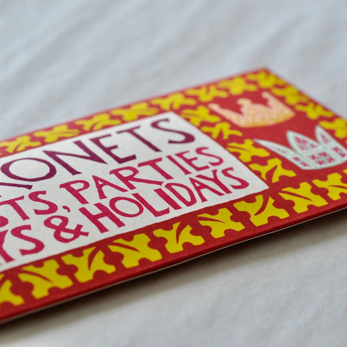 Decorative card with text and floral patterns on a white background