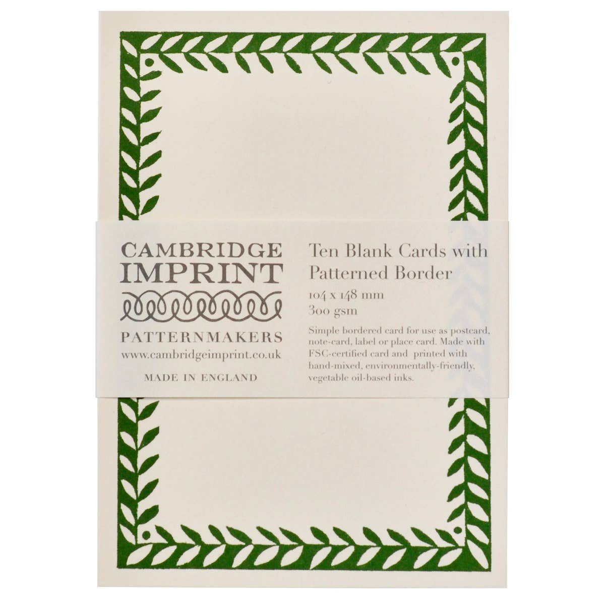 Packaging of Cambridge Imprint blank cards with green patterned border on a white background