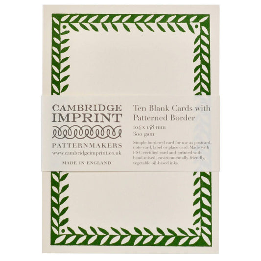 Packaging of Cambridge Imprint blank cards with green patterned border on a white background