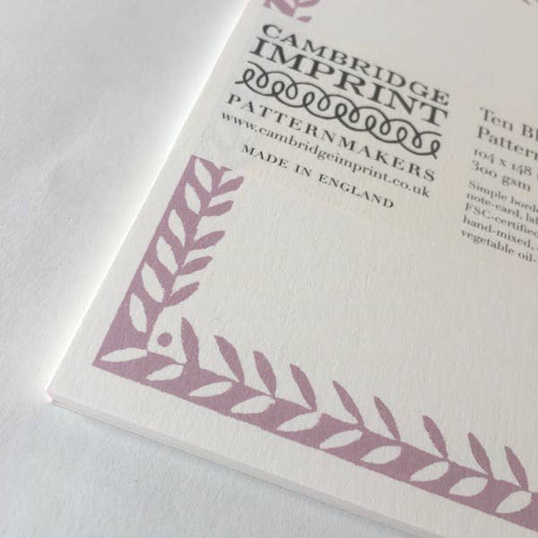 Cambridge Imprint pattern book with leaf design on a white background