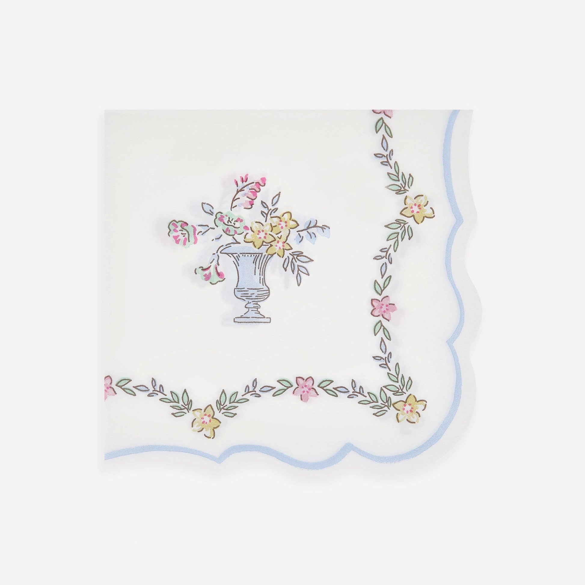 Embroidered tablecloth with floral design on a white background