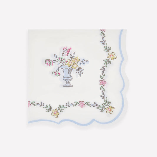 Embroidered tablecloth with floral design on a white background