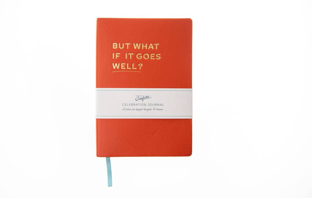 Red notebook with 'But what if it goes well?' text on a white background
