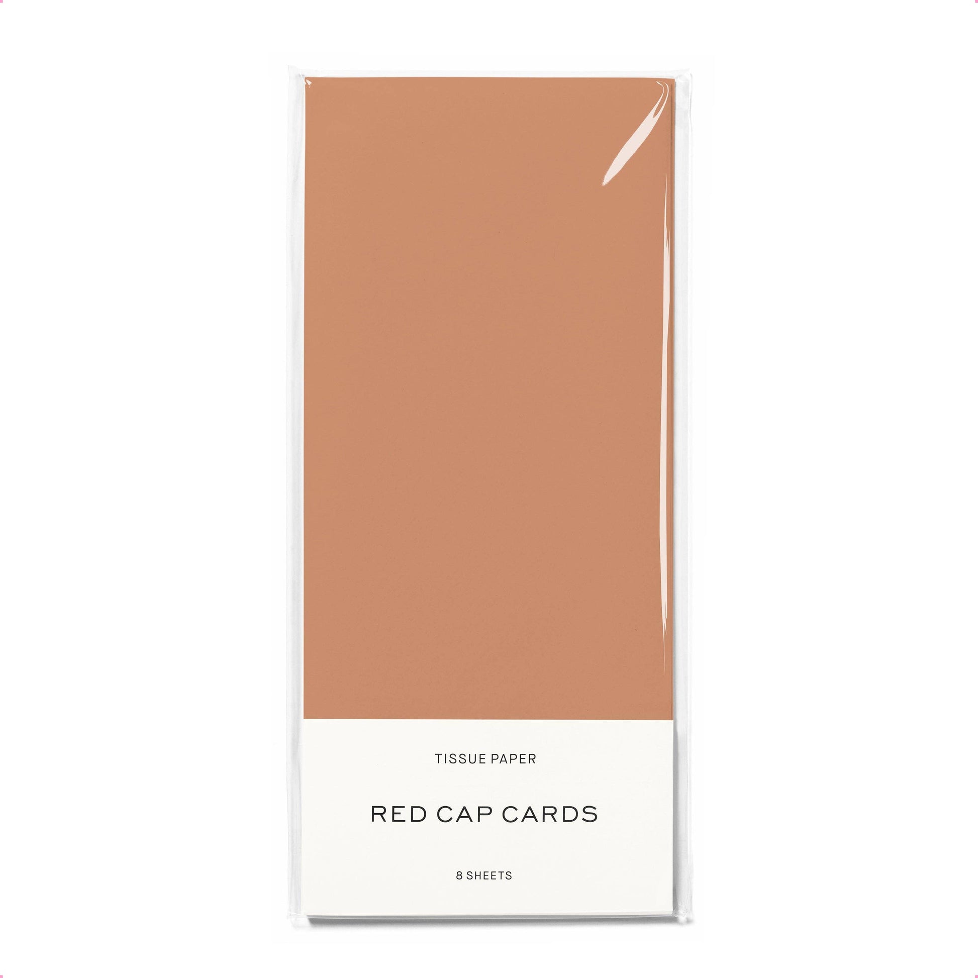 Tissue paper pack by Red Cap Cards with brown tissue paper and white label.