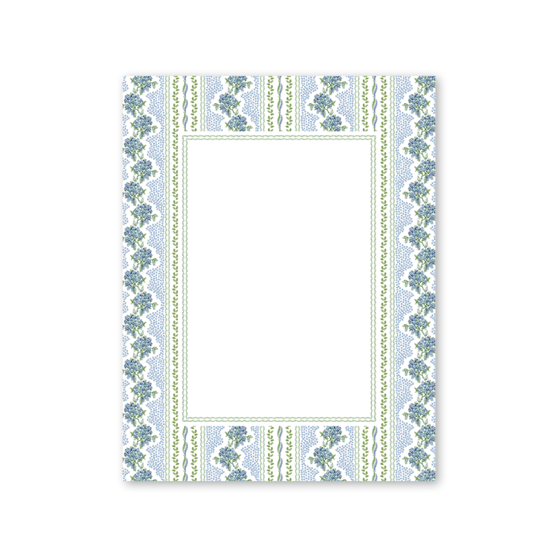 Decorative paper with floral border on a white background