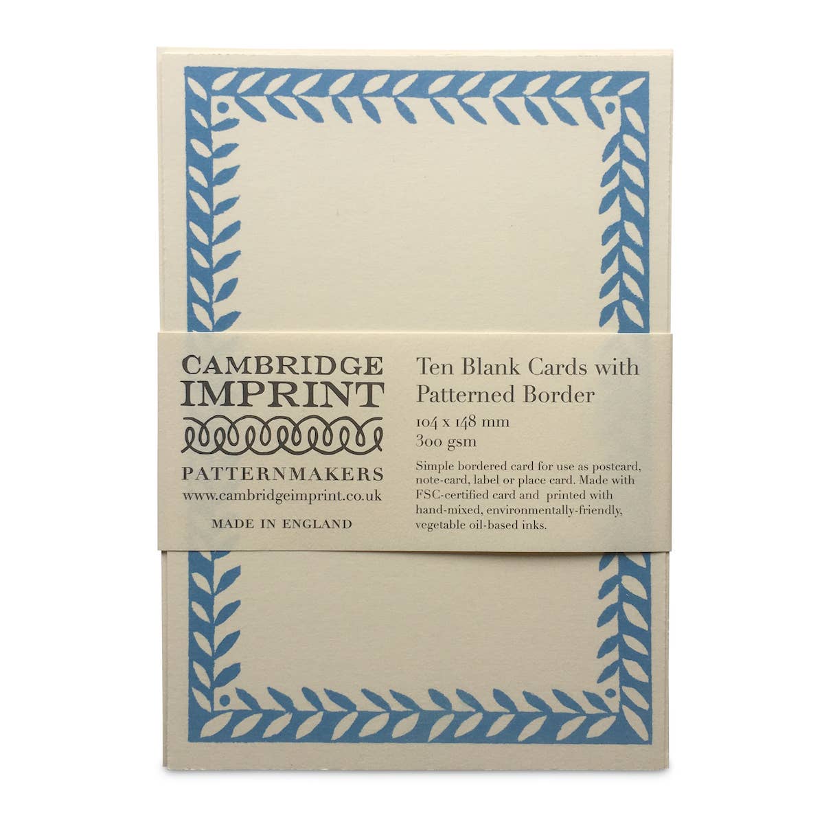 Pack of ten blank cards with patterned border by Cambridge Imprint on a beige background