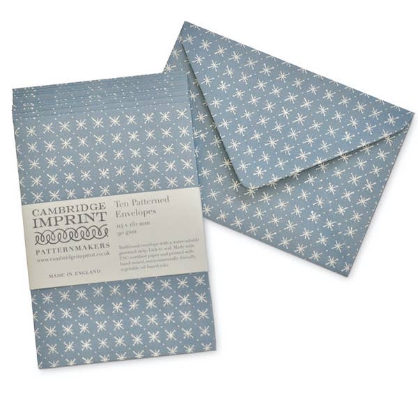 Two patterned envelopes with a Cambridge Imprint label on a white background