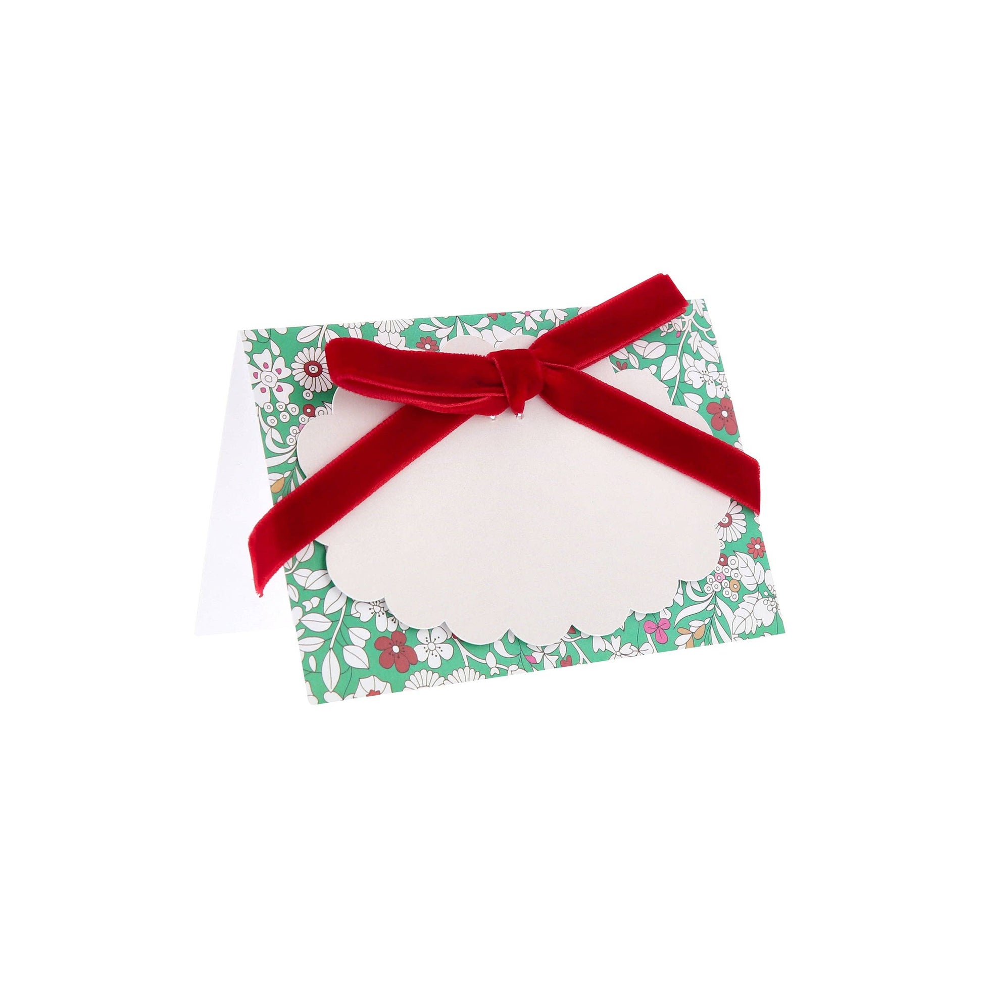 Floral-patterned box with a red ribbon place card