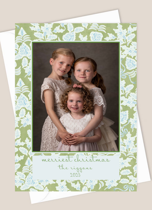 Christmas card with blue and green pattern and green font