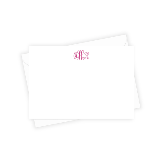 White pillowcases with pink monogram on a white background
