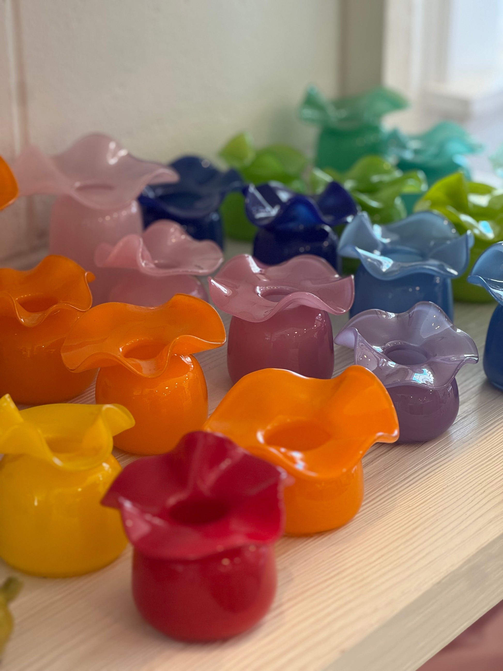 Colorful hand blown glass flower-shaped bud vases