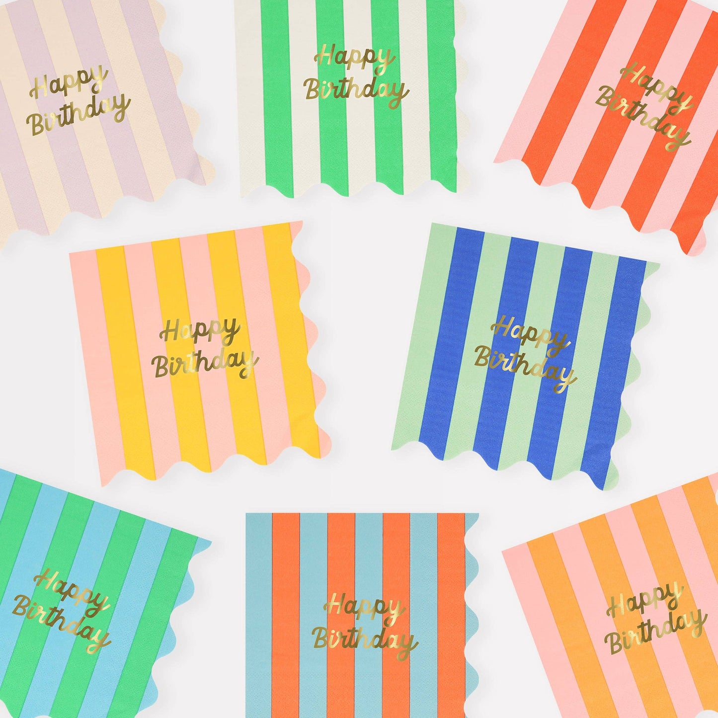 Colorful striped paper plates with 'Happy Birthday' text on a white background