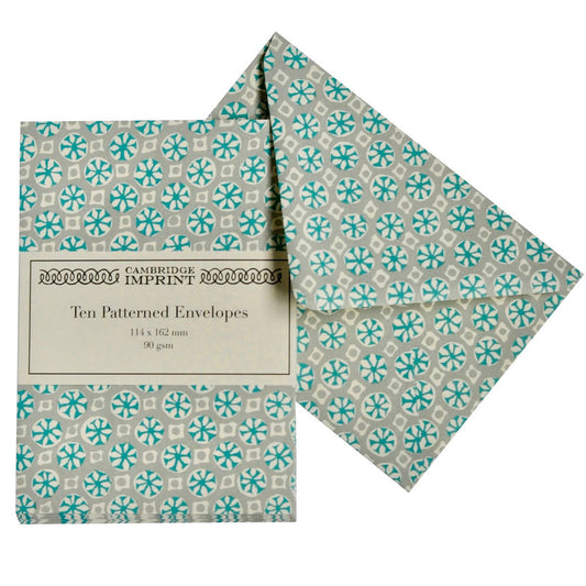 Patterned envelopes with Cambridge Imprint branding on a white background