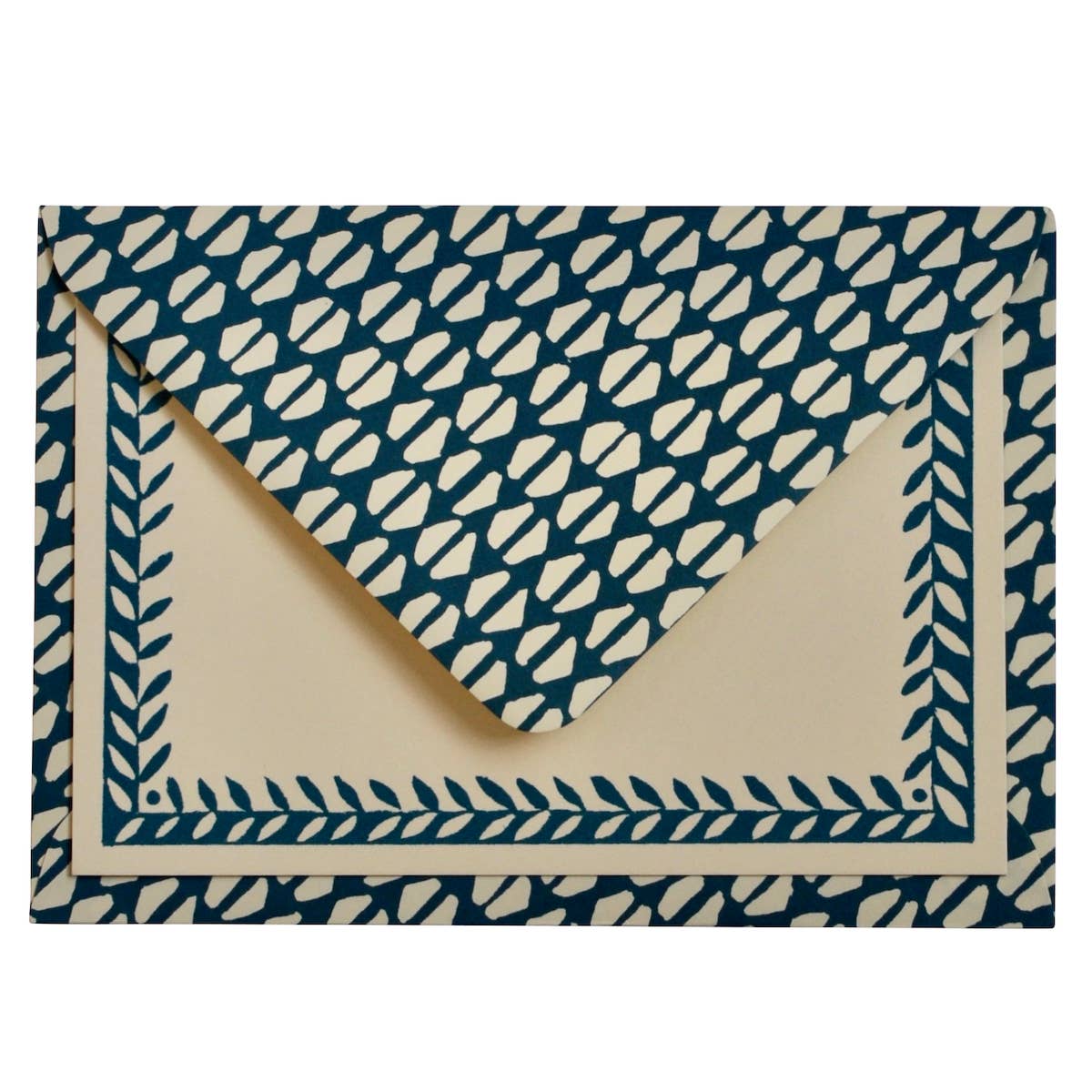 Patterned envelope with blue and white design on a white background