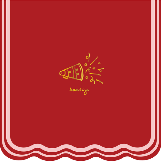 Red napkin with a gold 'hooray' design on a white background