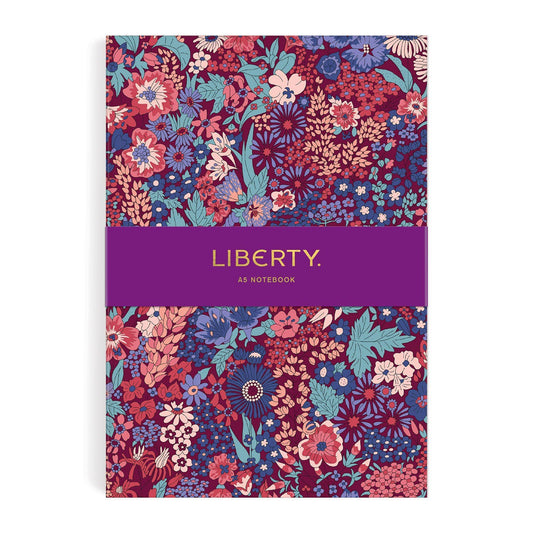 Floral notebook with 'Liberty' branding on a white background