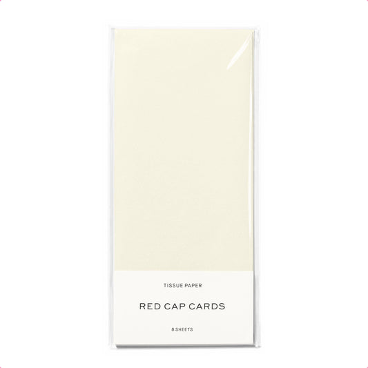 Pack of tissue paper with 'Red Cap Cards' branding on a white background