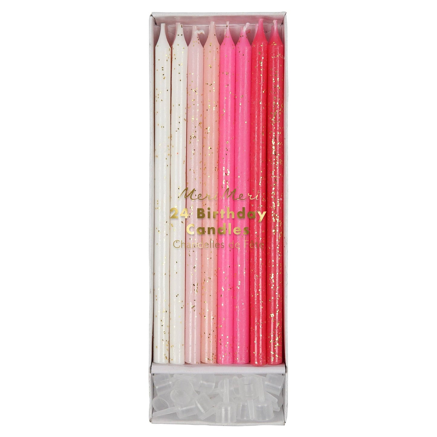 Set of birthday candles in pink, white, and gold packaging on a white background