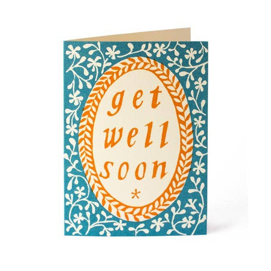 Greeting card with 'get well soon' text on a blue floral background