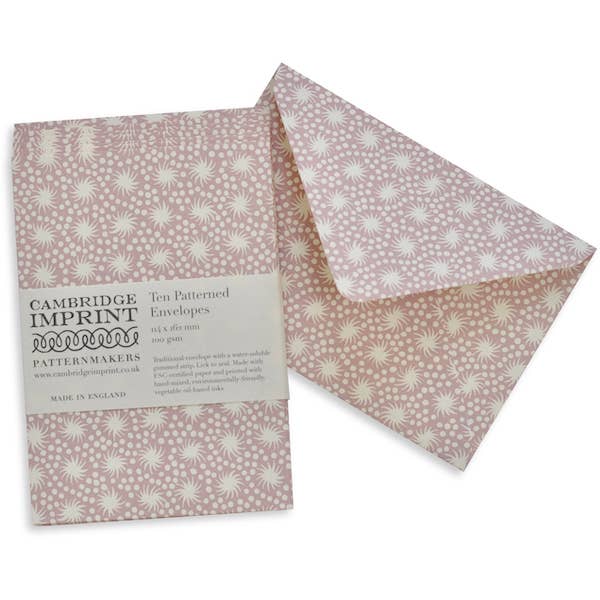 Cambridge Imprint tea patterned envelopes on a white background