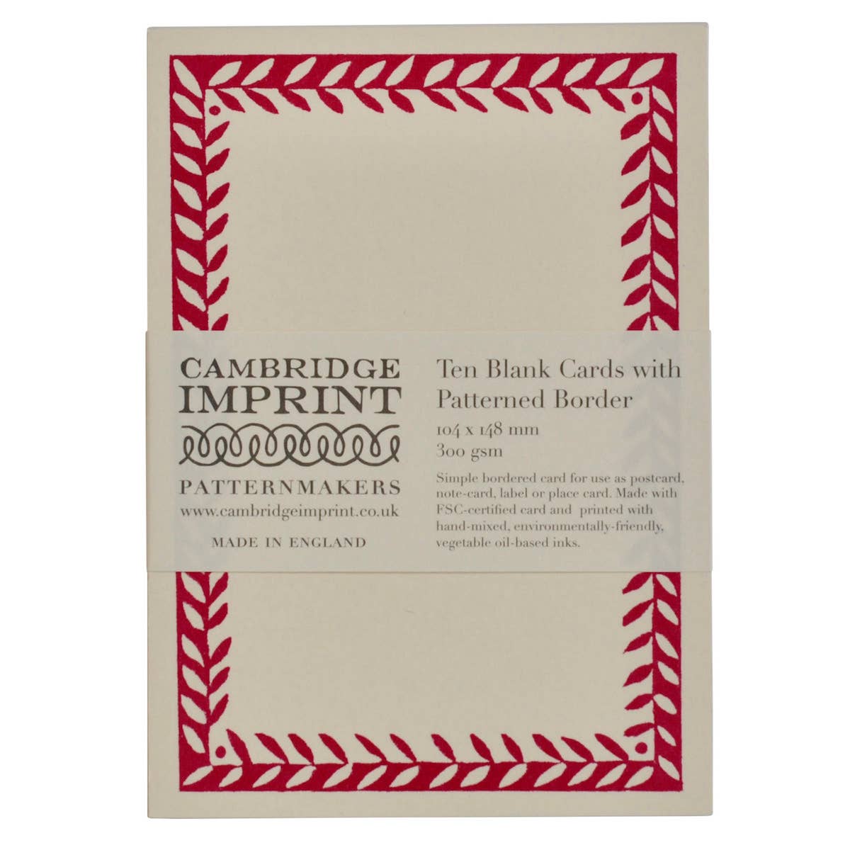 Pack of Cambridge Imprint blank cards with red patterned border on beige background
