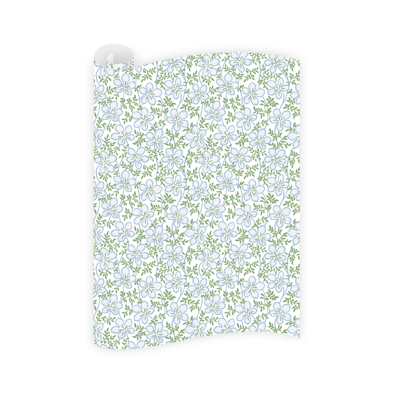 Floral patterned paper with blue flowers and green leaves on a white background