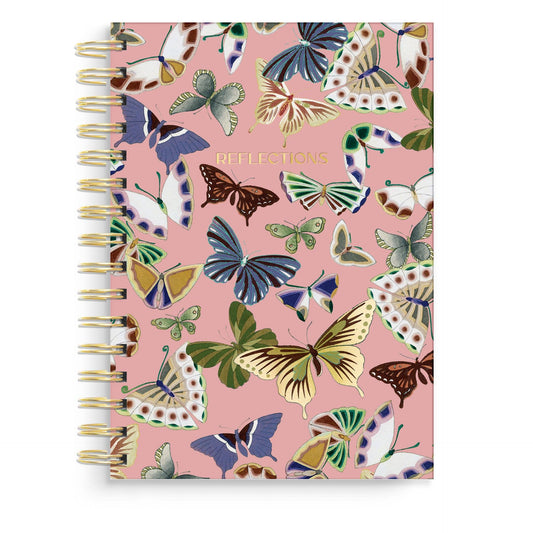 Notebook with butterfly design on a pink background