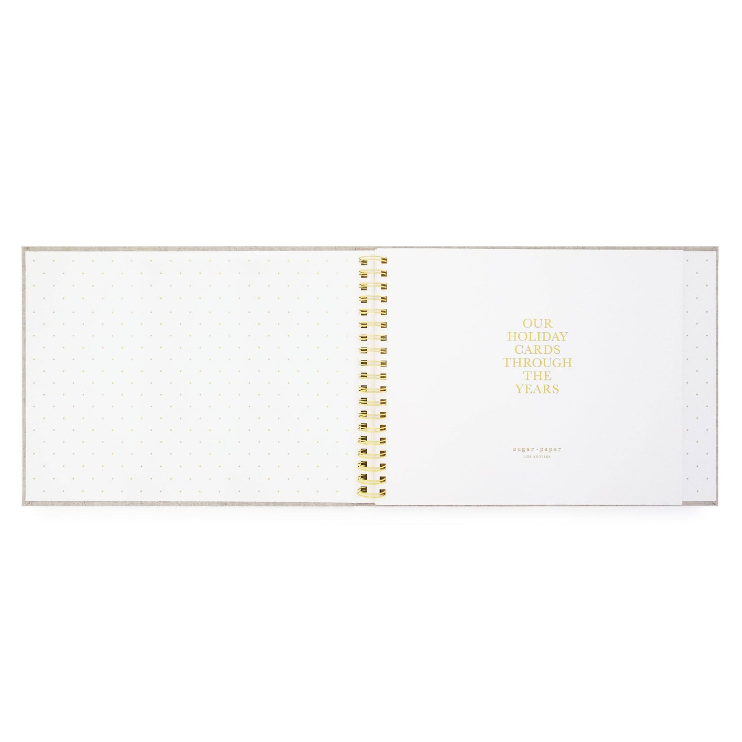 Spiral-bound planner with gold binding on a white background