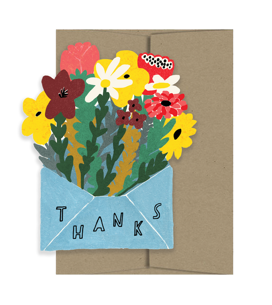 Greeting card with colorful flowers and 'THANKS' text on a brown envelope