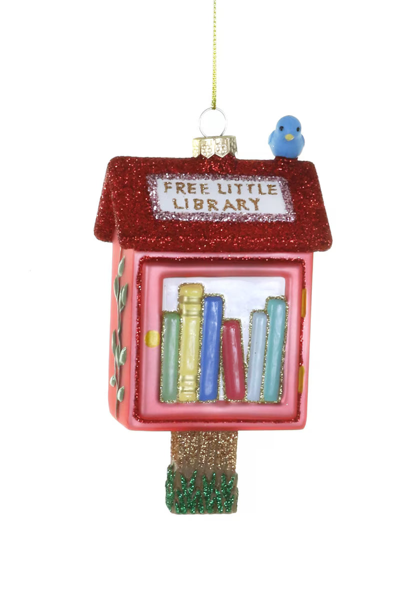 Decorative ornament of a 'Free Little Library' with books and a bird on a white background